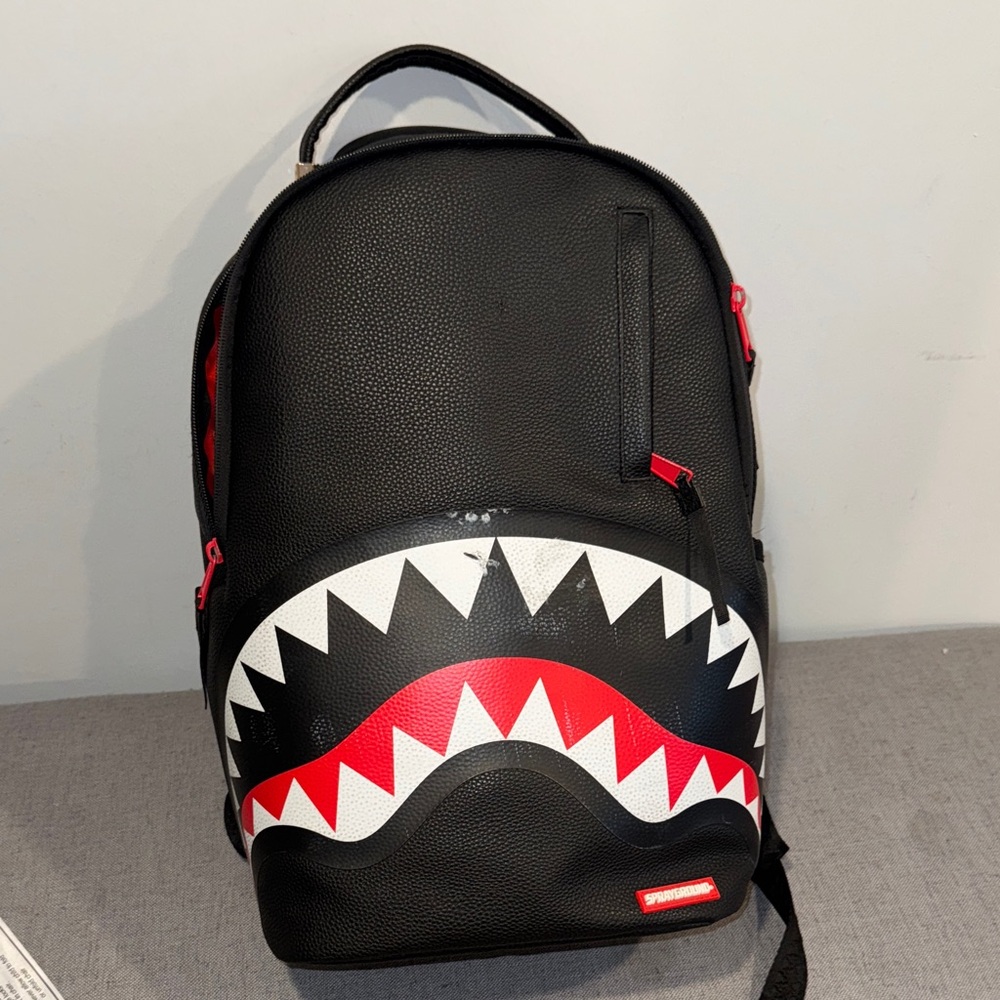 Black and Red Sprayground Backpack